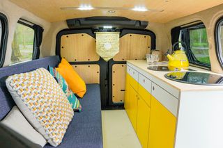 The interior of the van, featuring a kettle