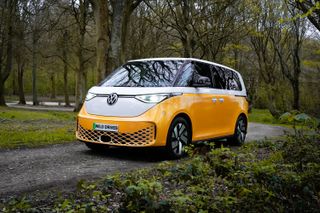 A read view shot of our ID Buzz campervan in the woods. You can see the interior.